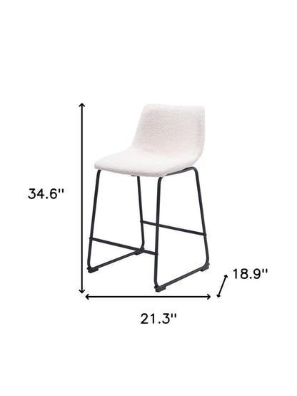 Set of Two 24" Ivory And Black Shearling And Steel Counter Height Bar Chairs