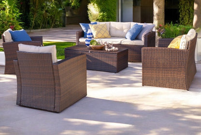 Five Piece Outdoor Dark Brown Wicker Sofa Seating Group with Beige Cushions