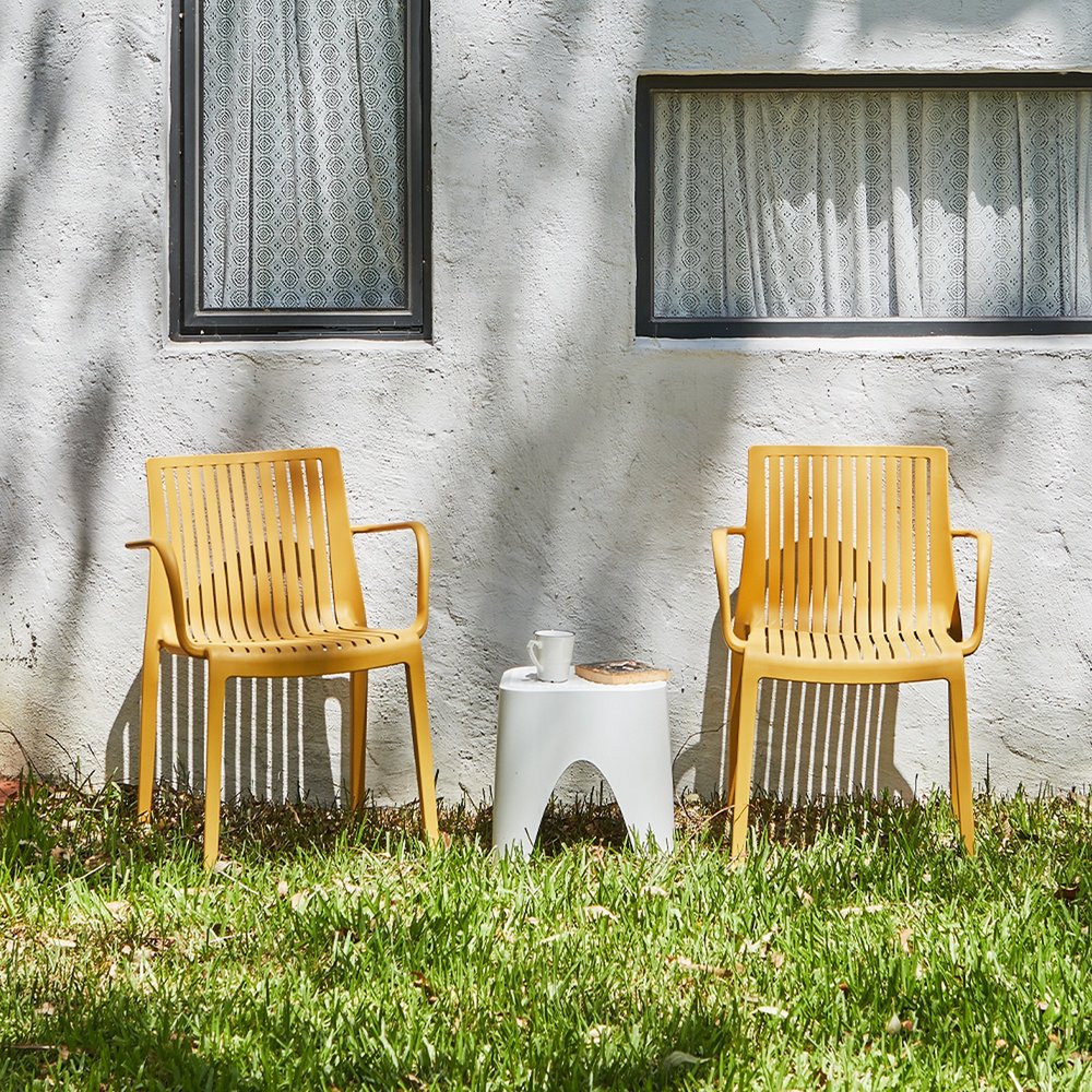 Set of Two Yellow Heavy Duty Plastic Outdoor Stacking Arm Chairs