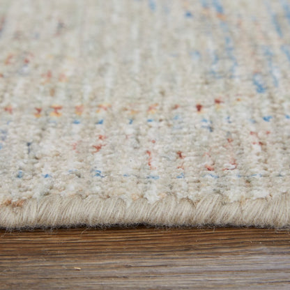 9' X 12' Tan Brown and Blue Floral Hand Woven Distressed Area Rug With Fringe