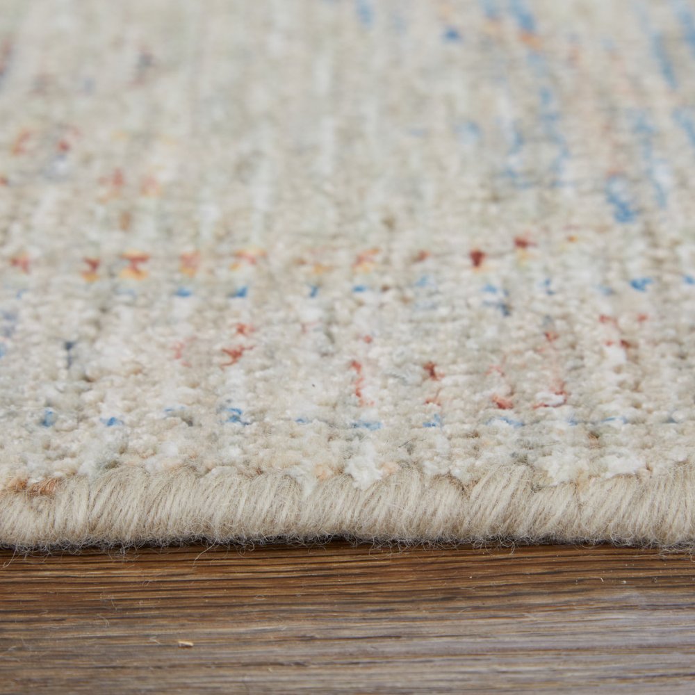 4' X 6' Tan Brown and Blue Floral Hand Woven Distressed Area Rug With Fringe