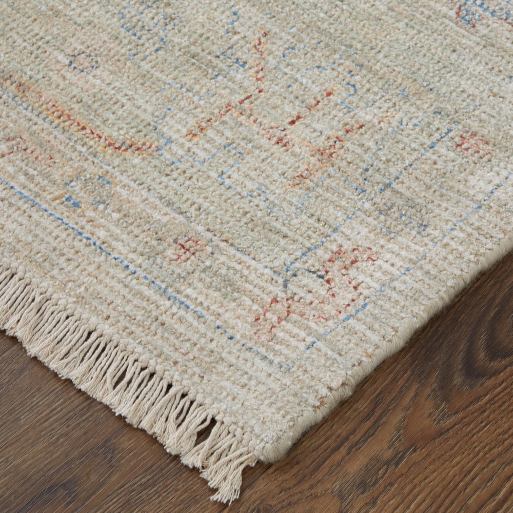 4' X 6' Tan Brown and Blue Floral Hand Woven Distressed Area Rug With Fringe