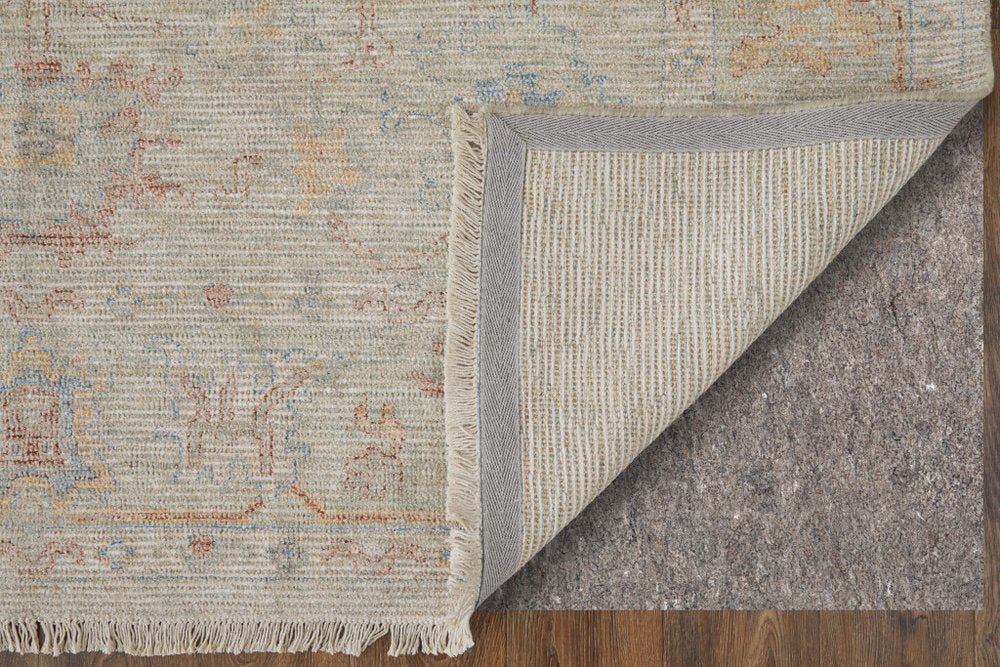 9' X 12' Tan Brown and Blue Floral Hand Woven Distressed Area Rug With Fringe