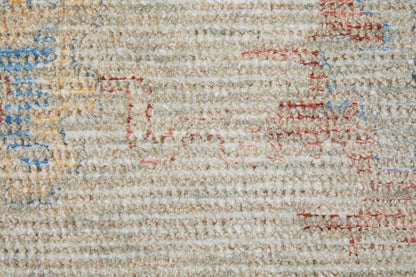 9' X 12' Tan Brown and Blue Floral Hand Woven Distressed Area Rug With Fringe