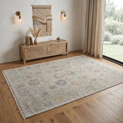 4' X 6' Tan Brown and Blue Floral Hand Woven Distressed Area Rug With Fringe