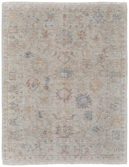 4' X 6' Tan Brown and Blue Floral Hand Woven Distressed Area Rug With Fringe