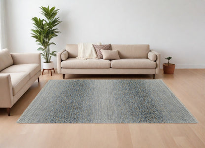 9' X 13' Ivory Blue and Brown Wool Hand Knotted Area Rug With Fringe
