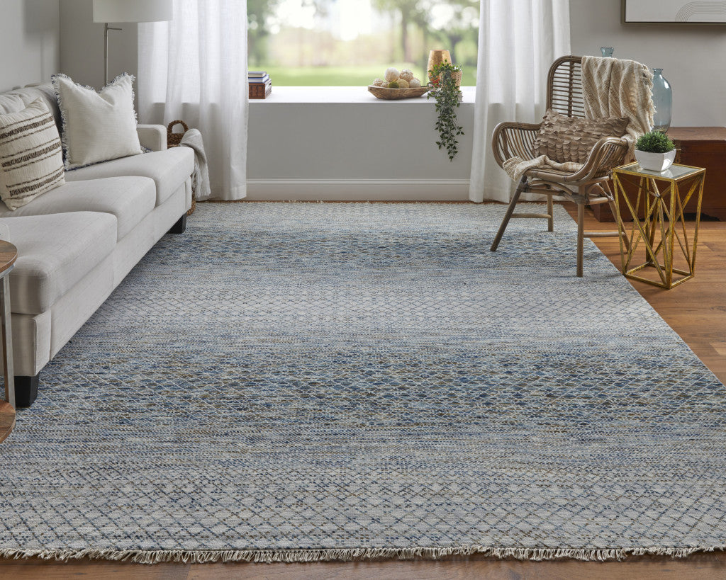 9' X 13' Ivory Blue and Brown Wool Hand Knotted Area Rug With Fringe