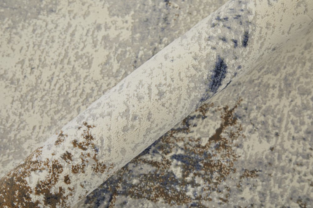 5' X 8' Ivory Blue and Brown Abstract Power Loom Area Rug