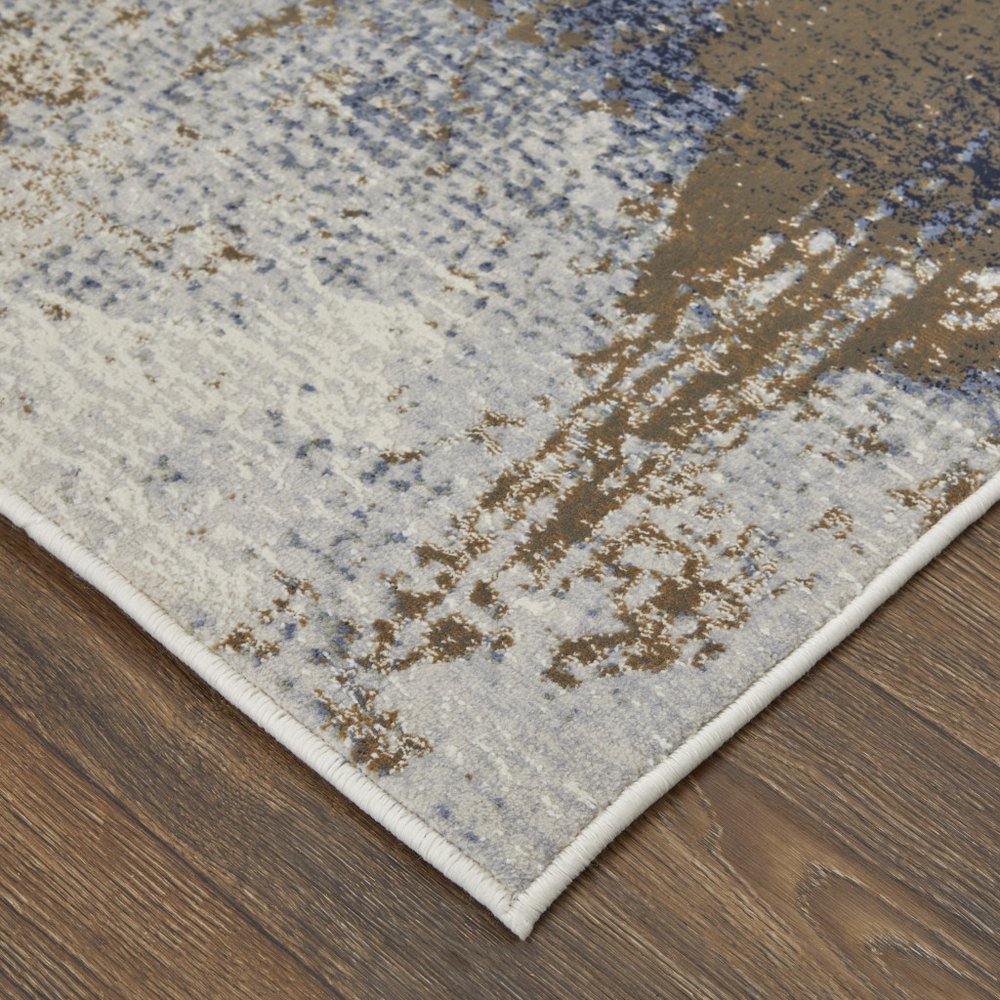 9' X 12' Ivory Blue and Brown Abstract Power Loom Area Rug