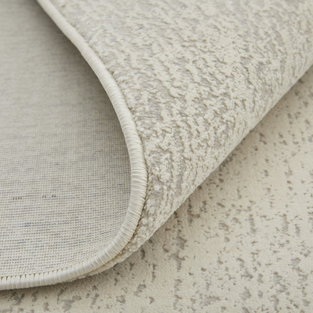 5' X 8' Ivory Blue and Brown Abstract Power Loom Area Rug