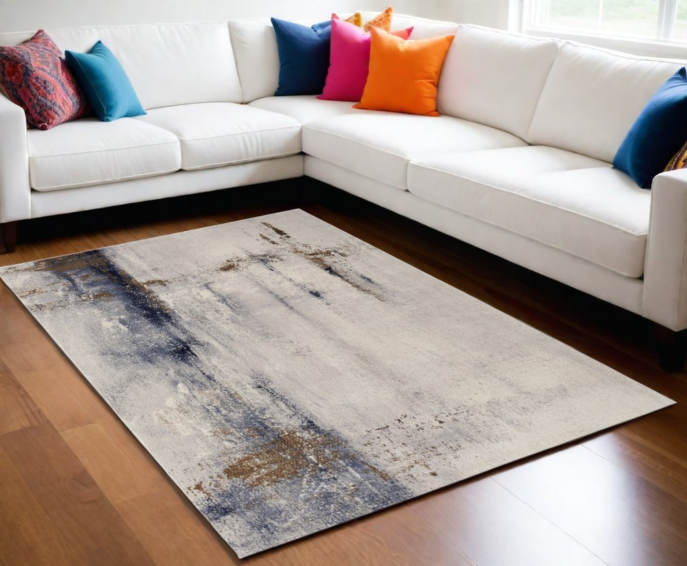 9' X 12' Ivory Blue and Brown Abstract Power Loom Area Rug