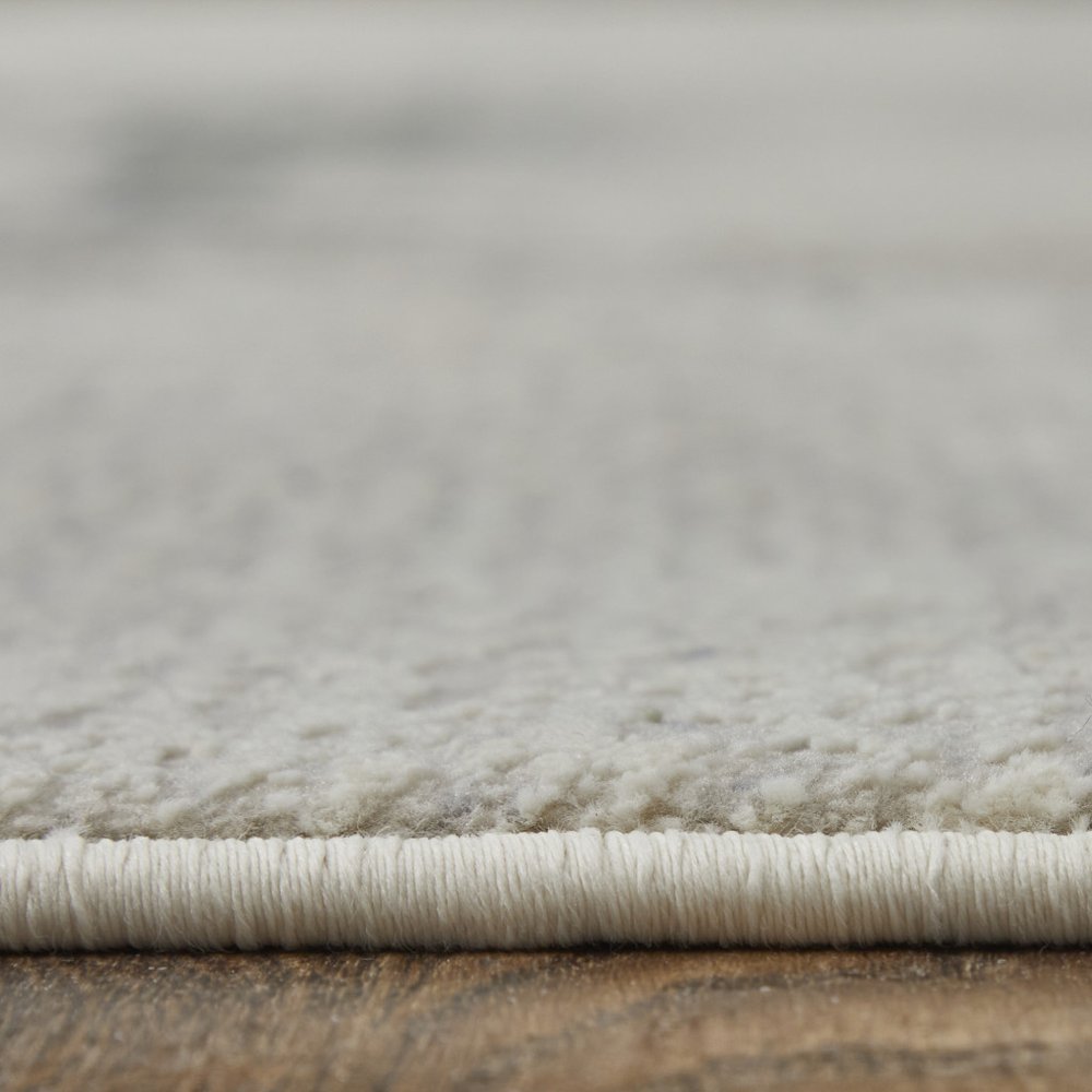 5' X 8' Ivory Blue and Brown Abstract Power Loom Area Rug