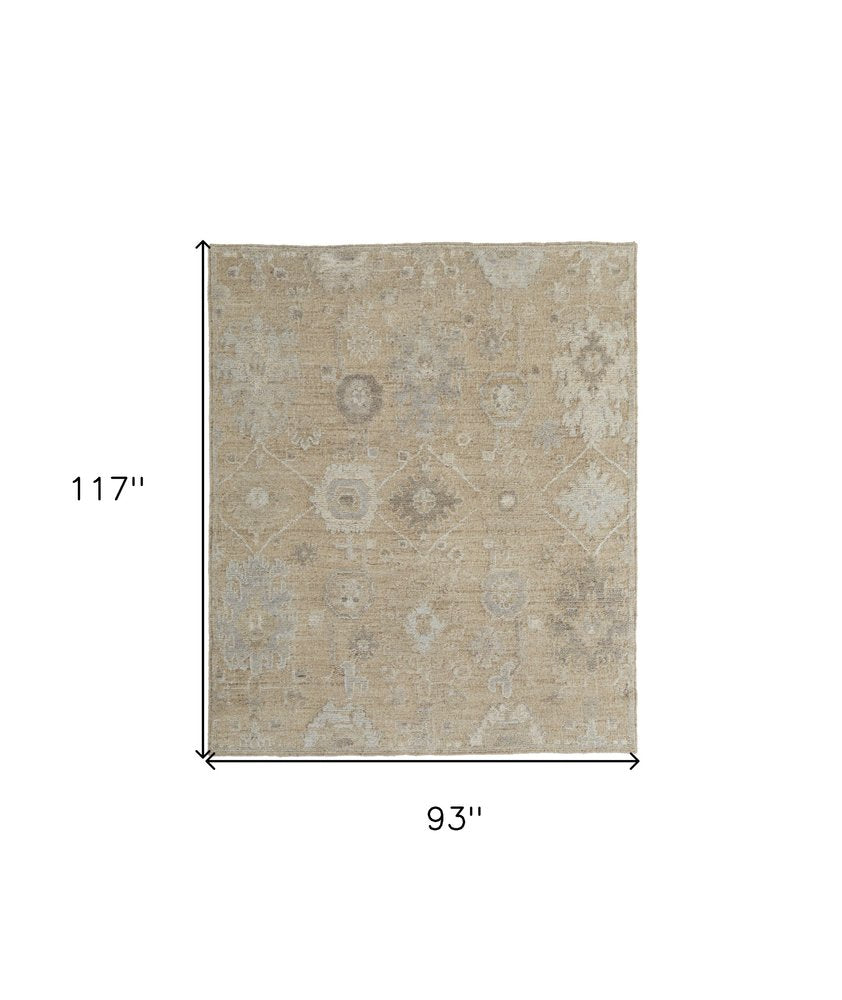8' X 10' Tan and Ivory Wool Floral Hand Knotted Area Rug