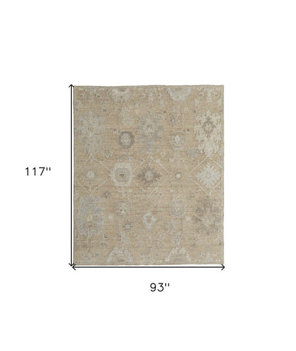 8' X 10' Tan and Ivory Wool Floral Hand Knotted Area Rug