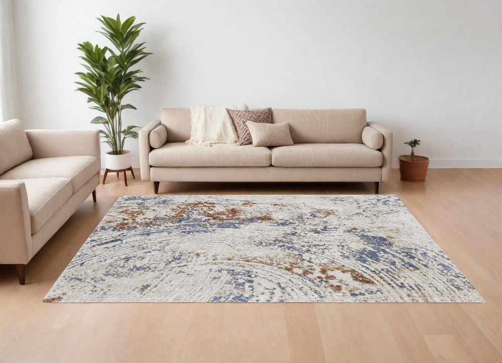 8' X 10' Ivory Blue and Brown Abstract Power Loom Area Rug