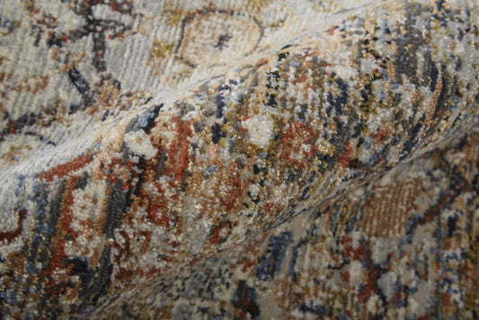 3' X 5' Tan Blue And Burnt Orange Oriental Area Rug With Fringe