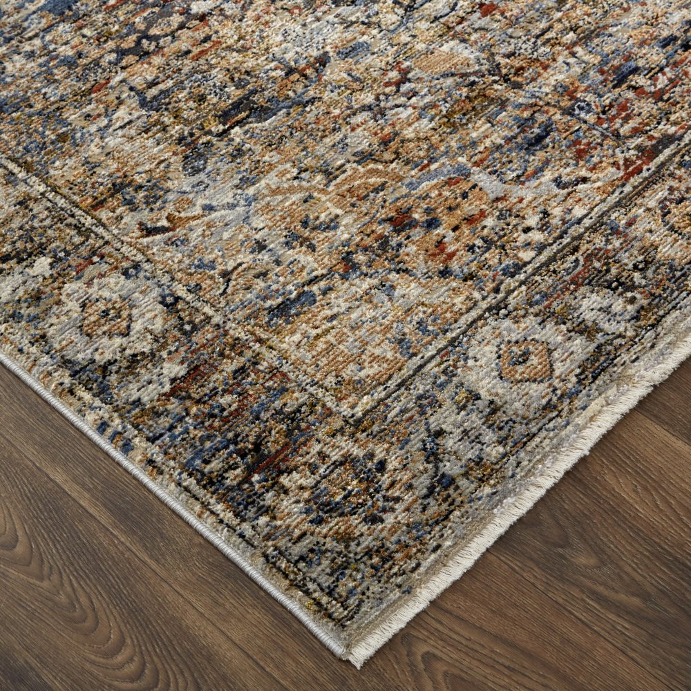 3' X 5' Tan Blue And Burnt Orange Oriental Area Rug With Fringe