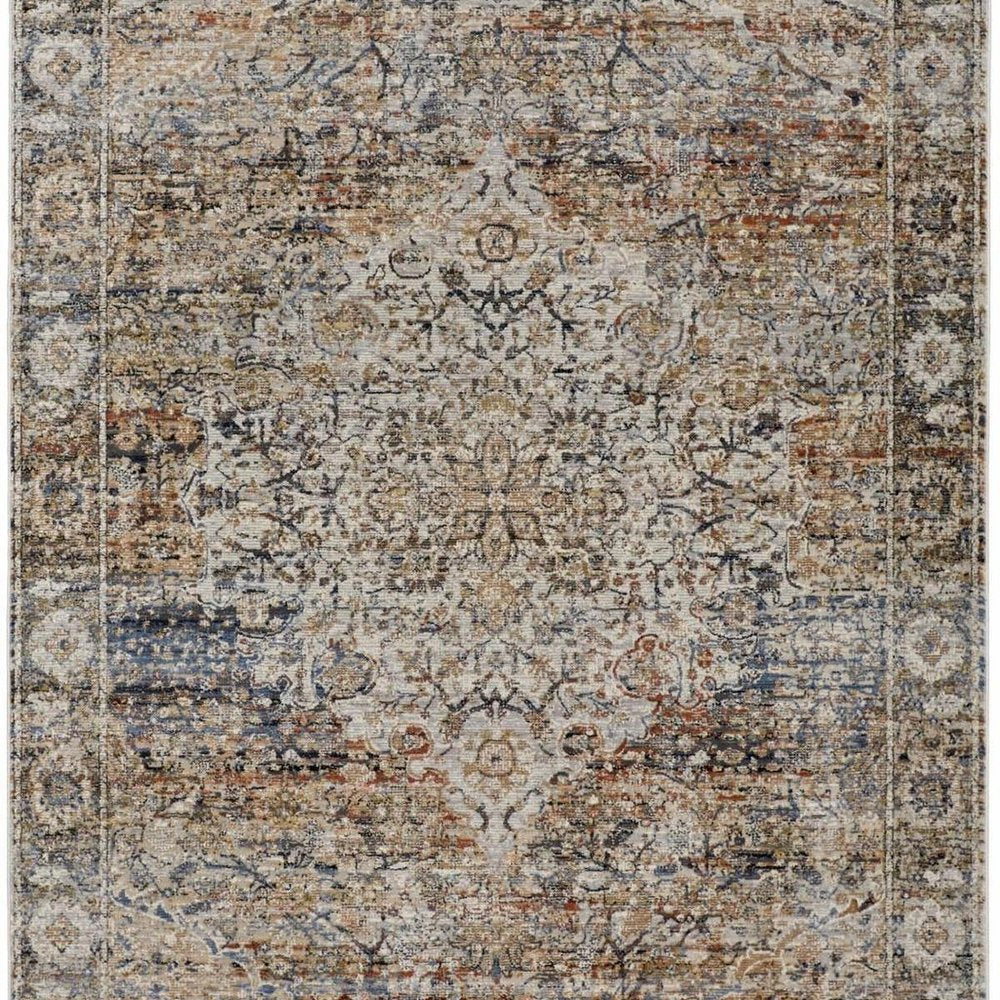 3' X 5' Tan Blue And Burnt Orange Oriental Area Rug With Fringe