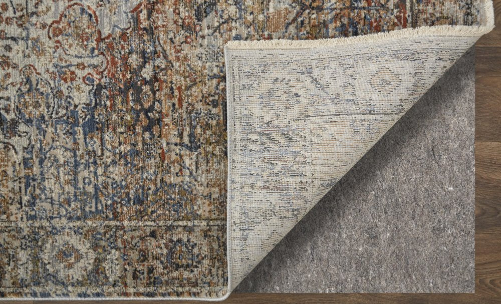 3' X 5' Tan Blue And Burnt Orange Oriental Area Rug With Fringe