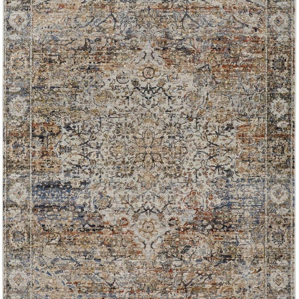 3' X 5' Tan Blue And Burnt Orange Oriental Area Rug With Fringe
