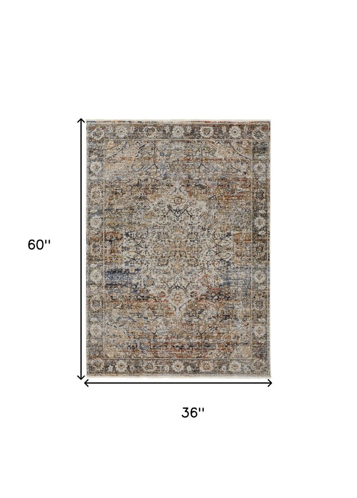 3' X 5' Tan Blue And Burnt Orange Oriental Area Rug With Fringe