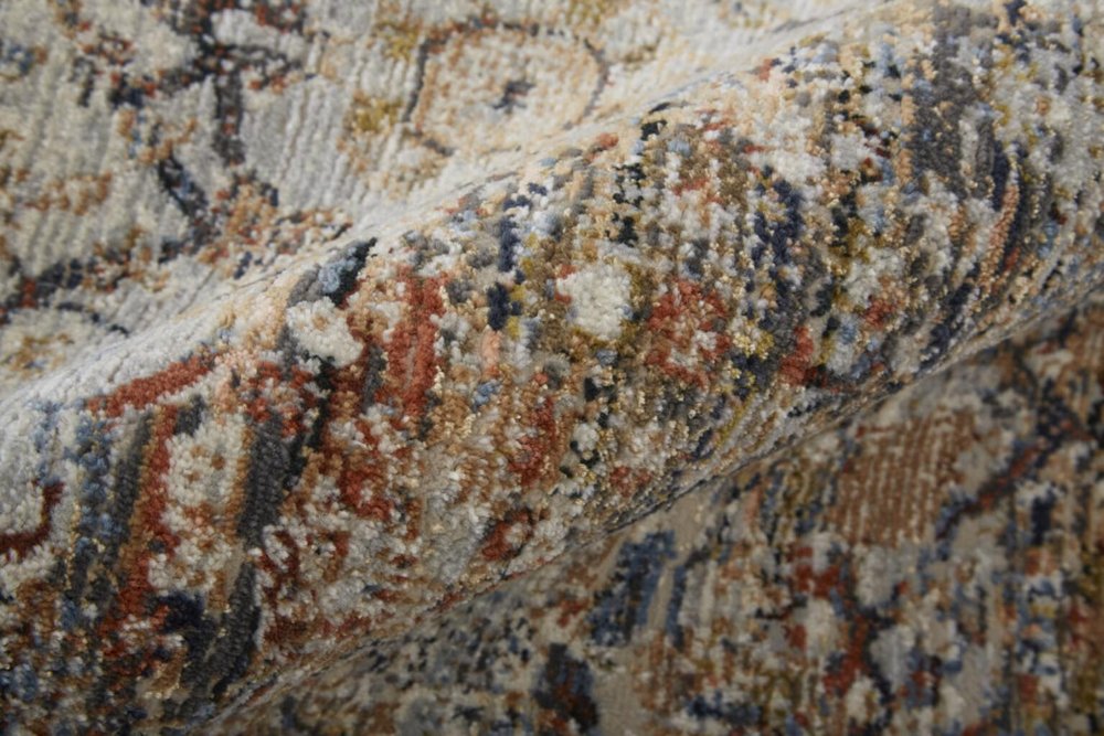 3' X 5' Tan Blue And Burnt Orange Oriental Area Rug With Fringe