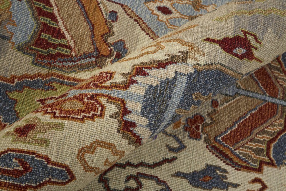 8' X 10' Ivory Blue and Brown Wool Ikat Hand Knotted Area Rug With Fringe