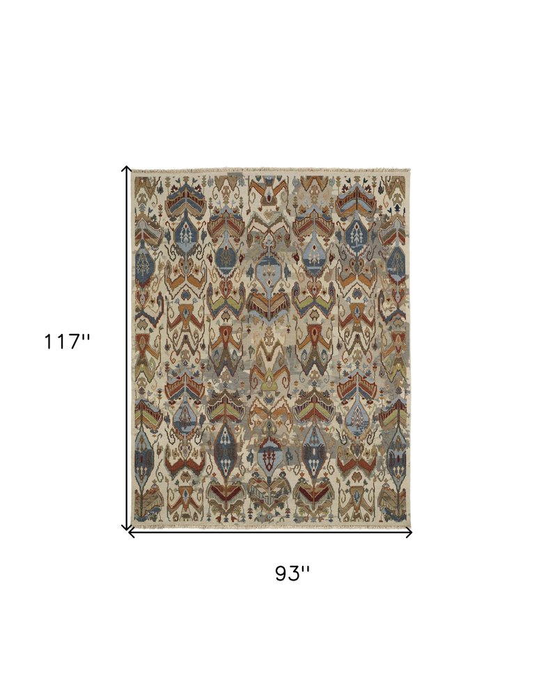 8' X 10' Ivory Blue and Brown Wool Ikat Hand Knotted Area Rug With Fringe