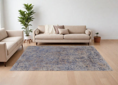 5' X 8' Blue Brown and Tan Abstract Power Loom Area Rug