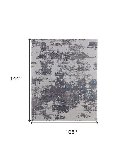 9' X 12' Ivory Brown and Blue Abstract Hand Tufted Area Rug