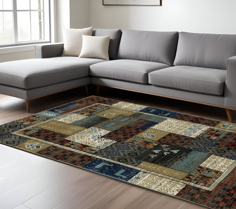 8' X 10' Brown Tan And Blue Patchwork Area Rug