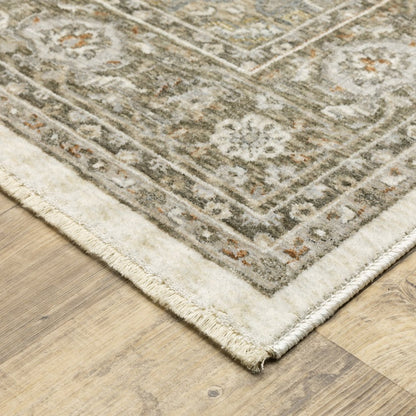 8' X 11' Ivory And Gold Medallion Distressed Area Rug With Fringe