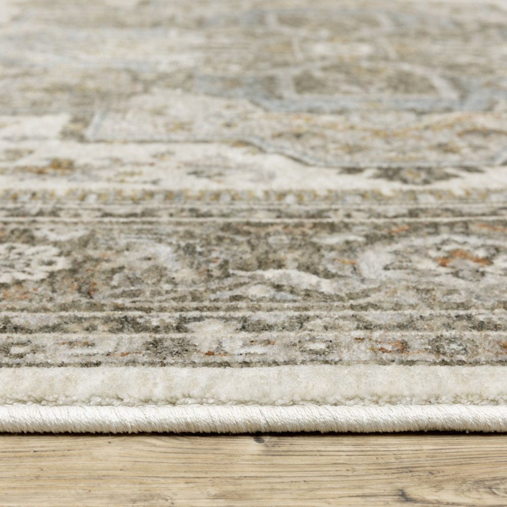 8' X 11' Ivory And Gold Medallion Distressed Area Rug With Fringe