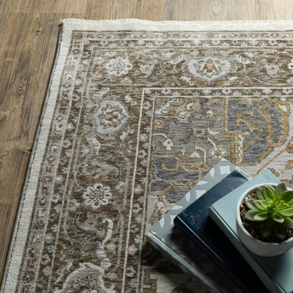 8' X 11' Ivory And Gold Medallion Distressed Area Rug With Fringe
