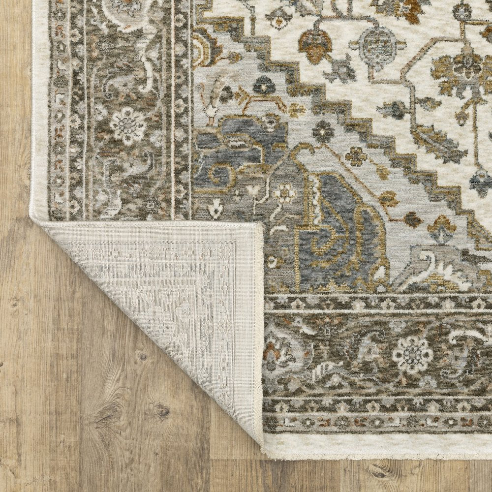 8' X 11' Ivory And Gold Medallion Distressed Area Rug With Fringe