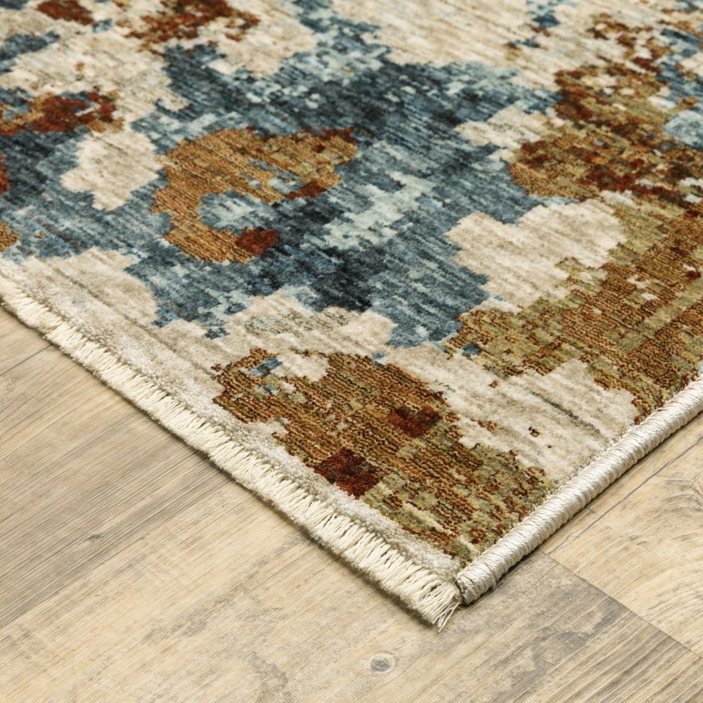 8' X 11' Beige Rust And Teal Abstract Distressed Area Rug With Fringe