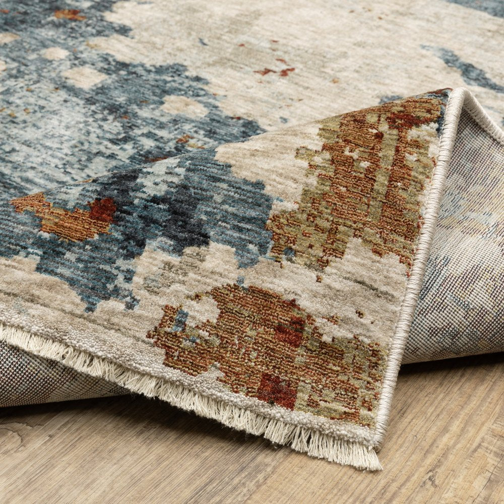 8' X 11' Beige Rust And Teal Abstract Distressed Area Rug With Fringe