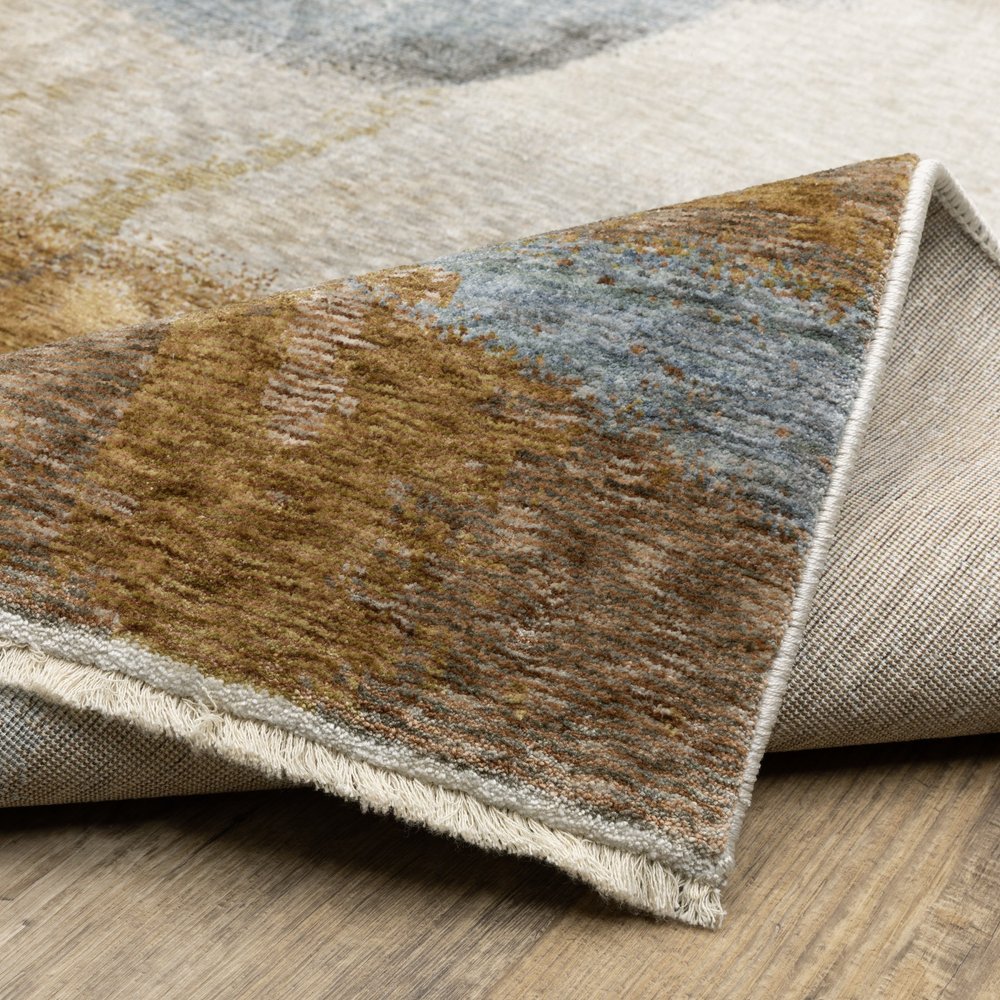 8' X 11' Beige And Rust Abstract Distressed Area Rug With Fringe