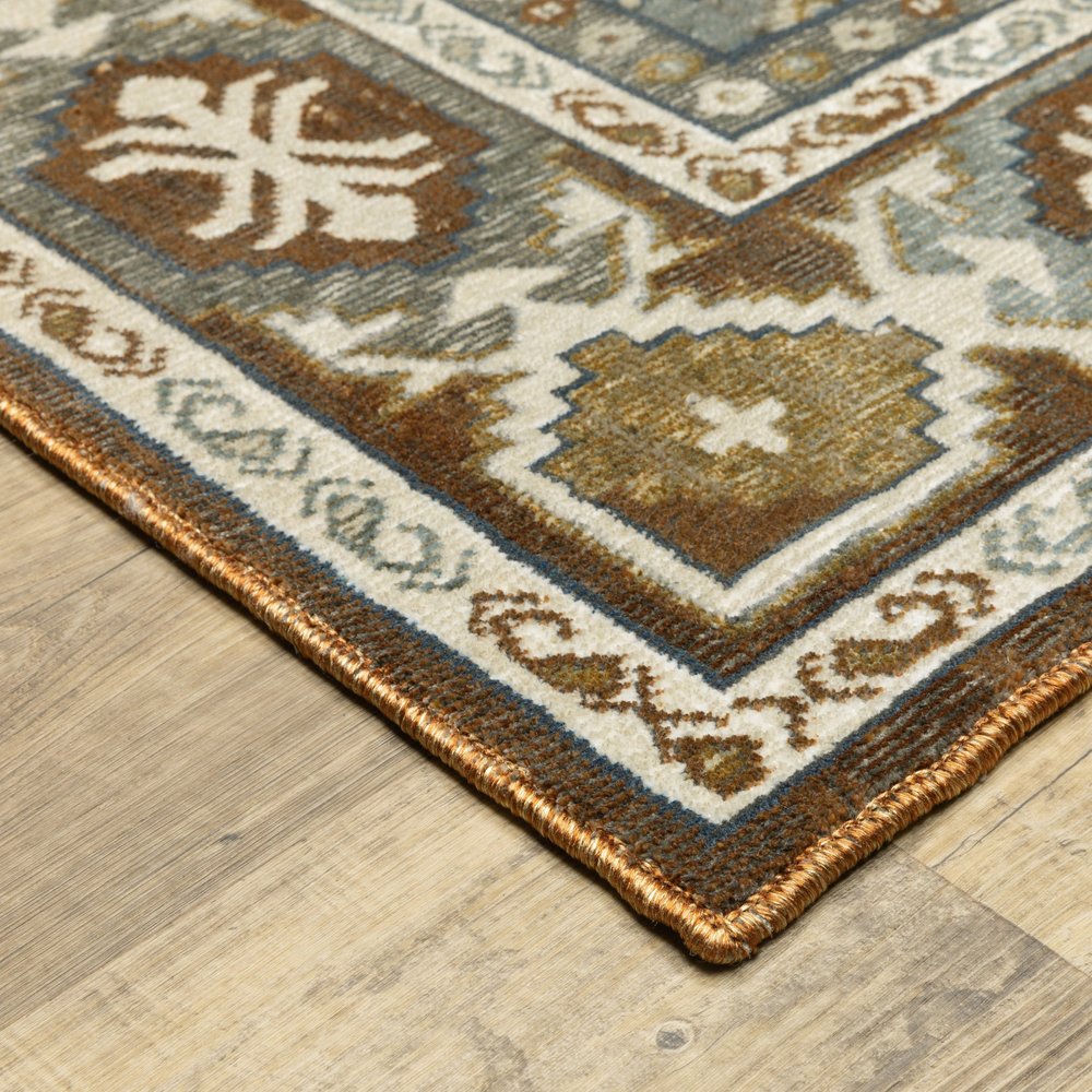 8' X 11' Ivory And Blue Medallion Area Rug