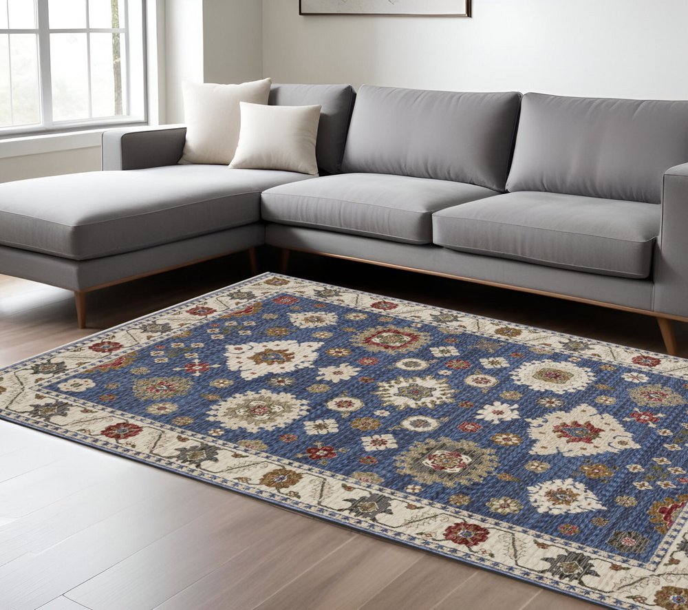 8' X 11' Blue And Ivory Floral Area Rug With Fringe