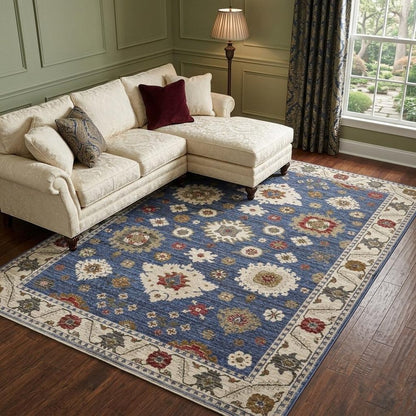 8' X 11' Blue And Ivory Floral Area Rug With Fringe