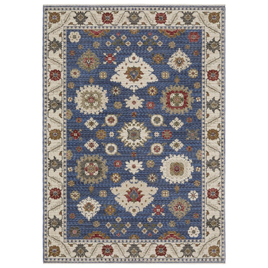 8' X 11' Blue And Ivory Floral Area Rug With Fringe
