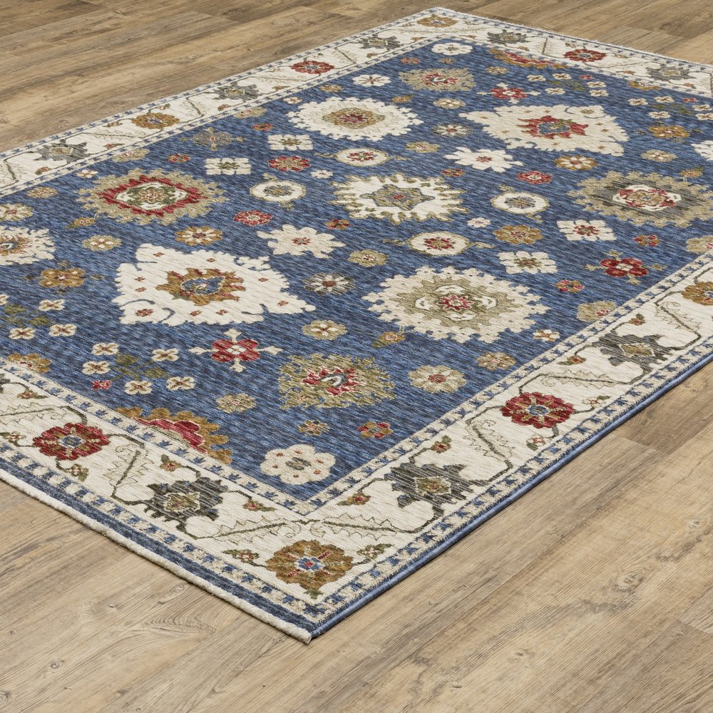 8' X 11' Blue And Ivory Floral Area Rug With Fringe