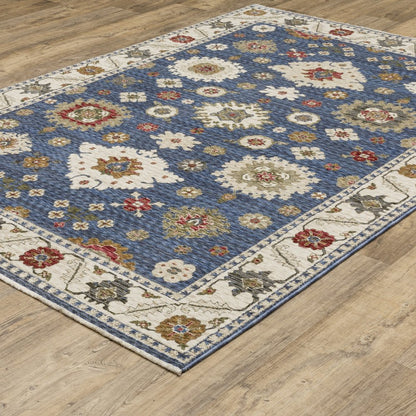 8' X 11' Blue And Ivory Floral Area Rug With Fringe