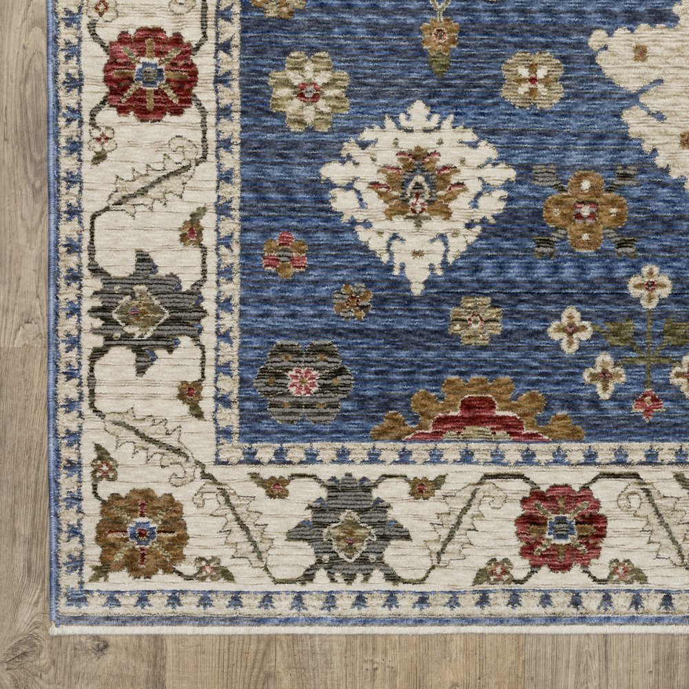 8' X 11' Blue And Ivory Floral Area Rug With Fringe