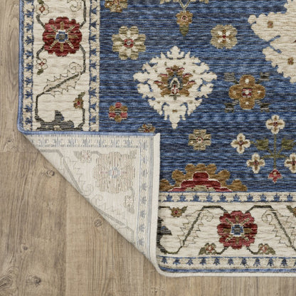 8' X 11' Blue And Ivory Floral Area Rug With Fringe