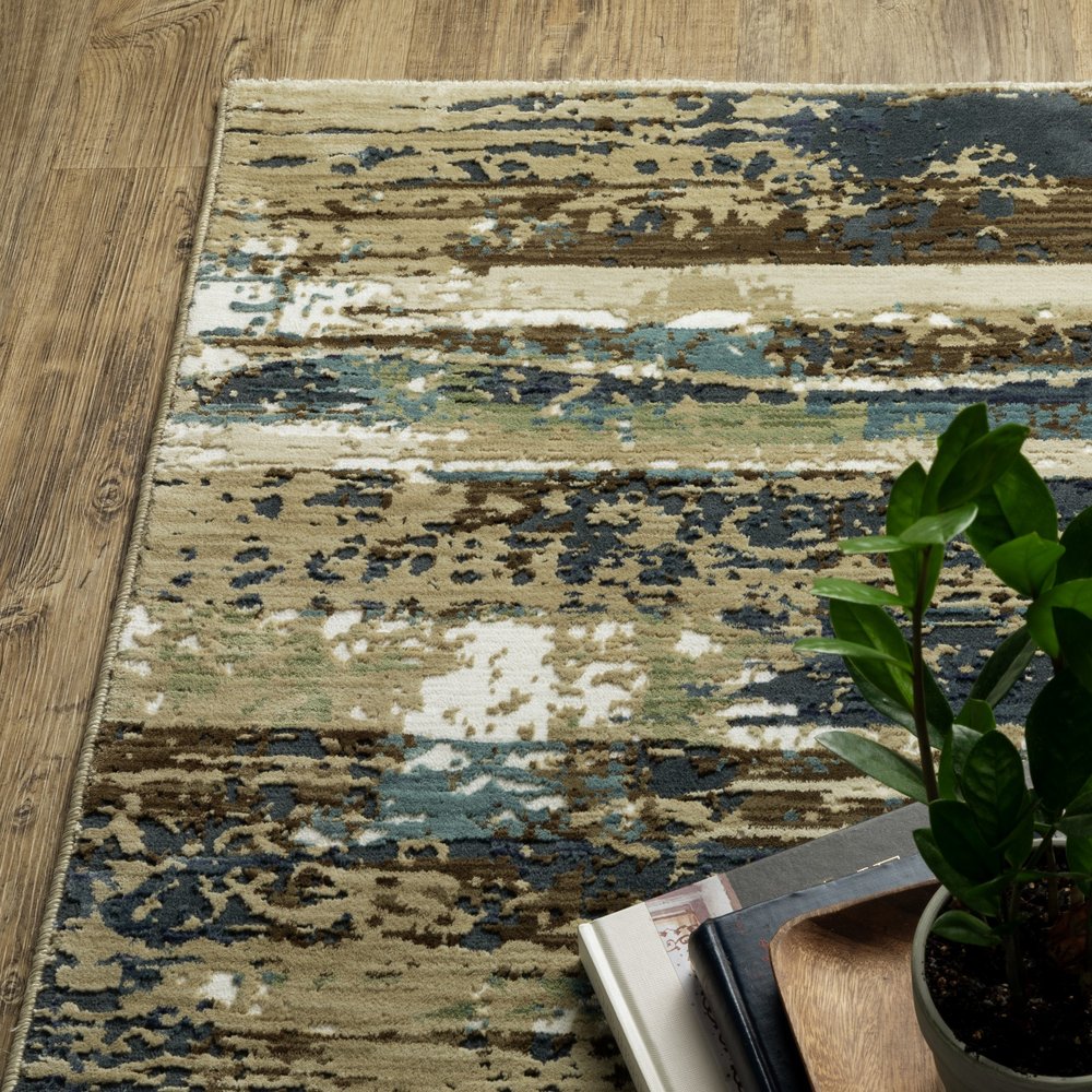 8' X 11' Beige And Blue Abstract Area Rug