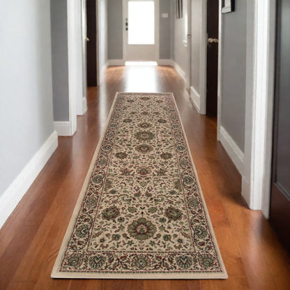 9' Ivory And Green Oriental Runner Rug