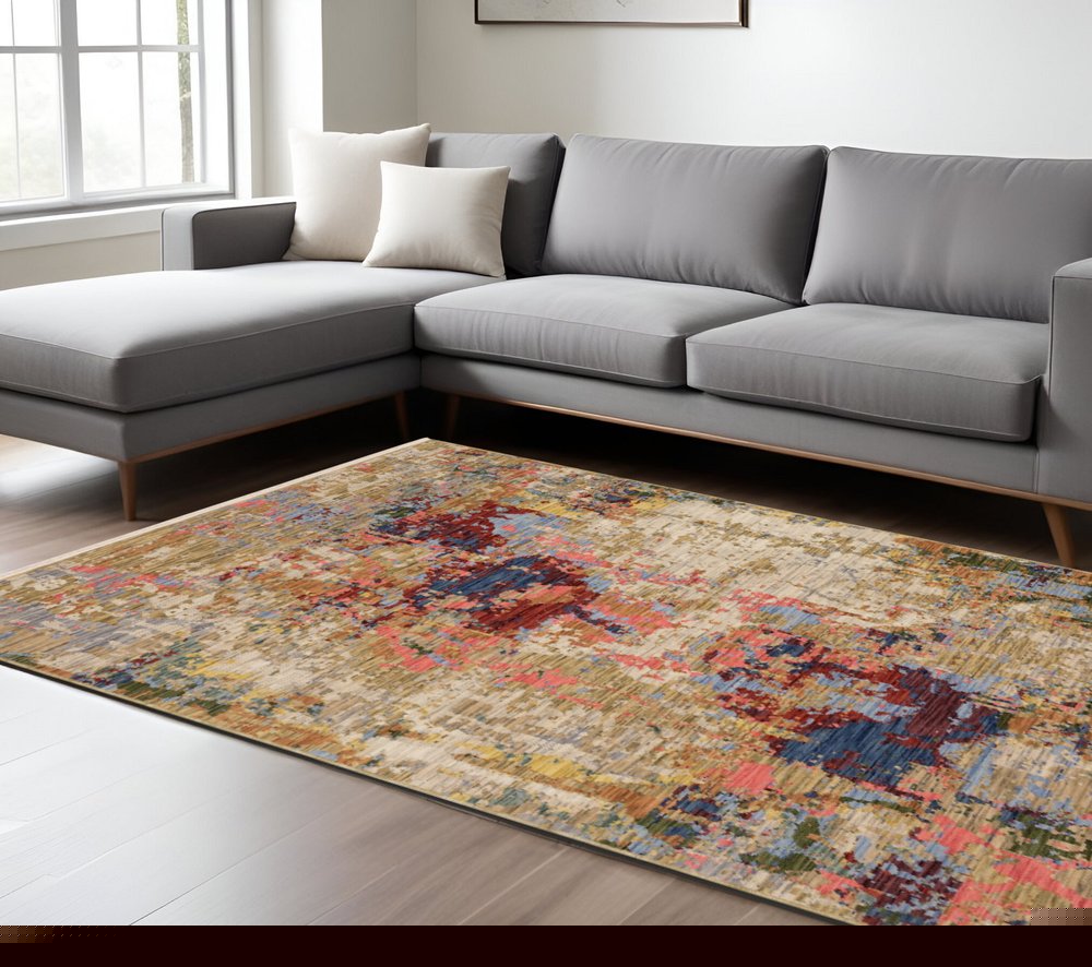 8' X 11' Beige Salmon And Tan Abstract Area Rug With Fringe